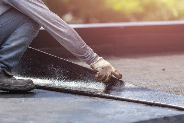 Professional Basement Waterproofing technician working in Conesville, OH